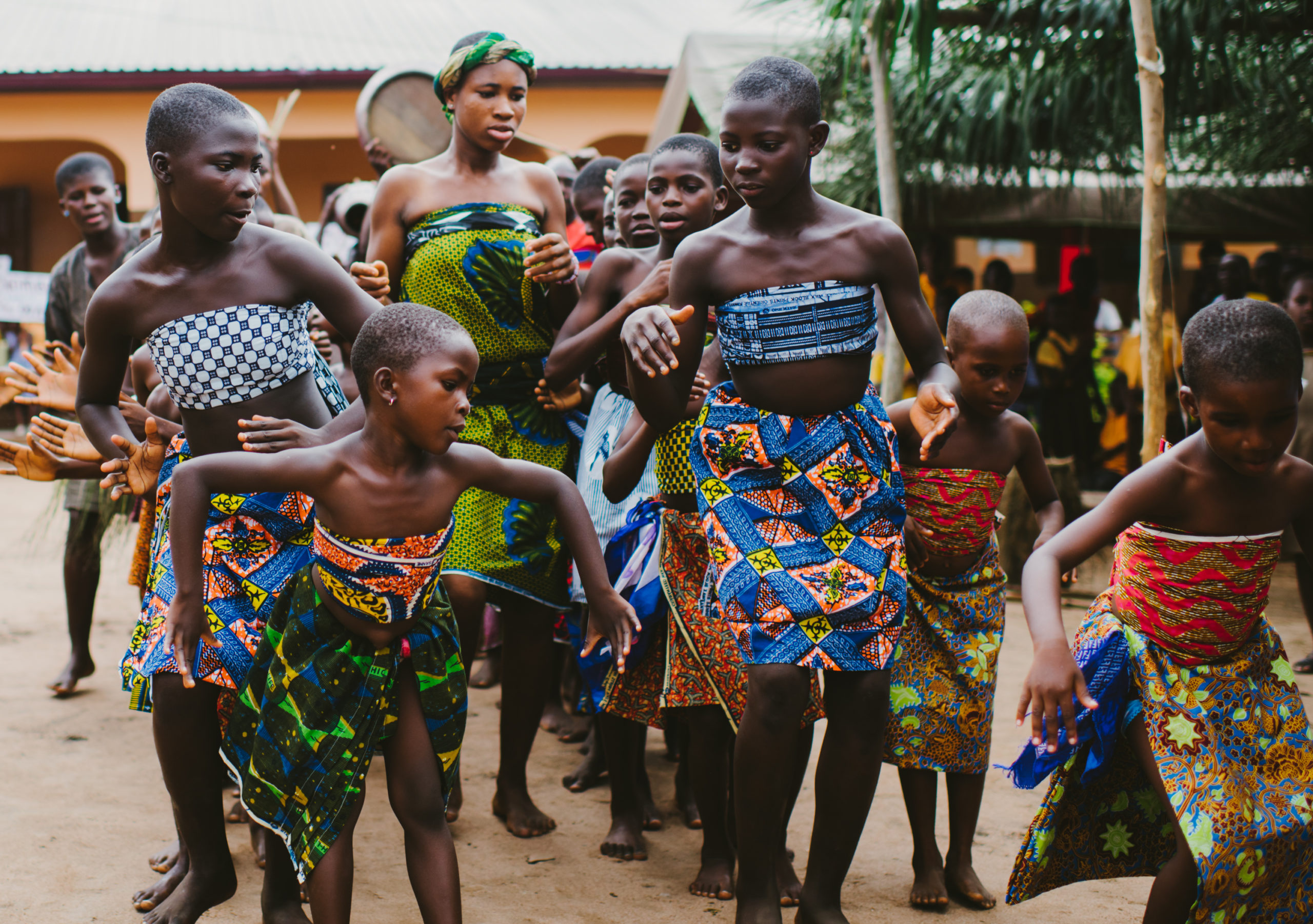 Community members in Ghana dance during the inauguration of a PoP school build. (Photo credit: Chi Chi Ari)